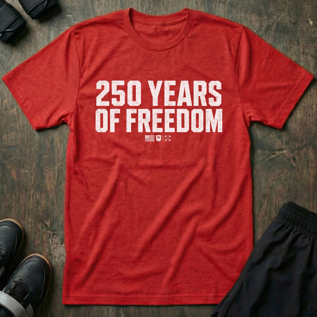 250 Years of Freedom Stack tee in Red: 250 YEARS OF FREEDOM in oversized distressed block letters stacked across the front