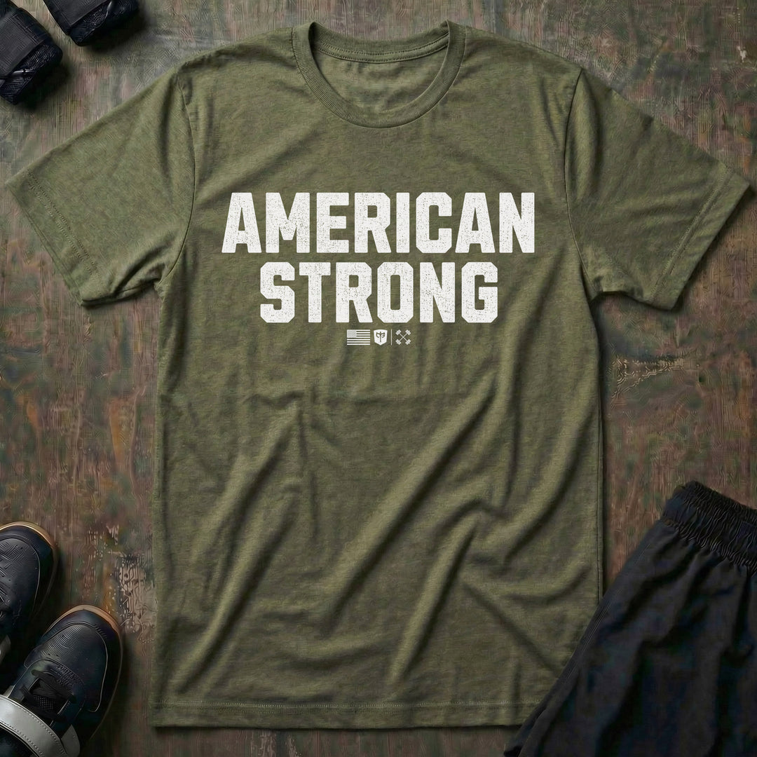 American Strong tee in Military: AMERICAN STRONG in bold distressed block letters with a small American flag