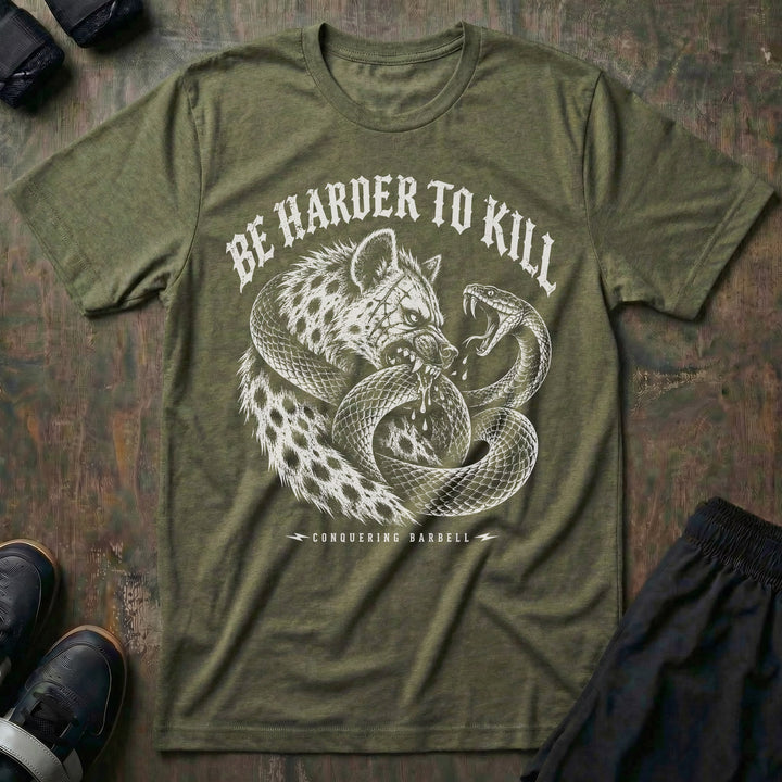 Be Harder to Kill Strike First tee in Military: a scarred hyena and a black mamba coiled around each other in full combat
