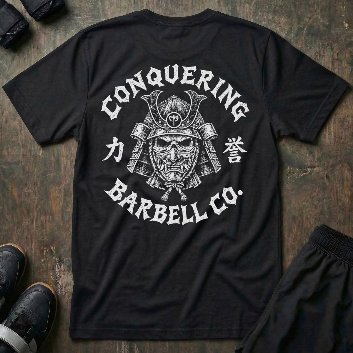 Bushido tee in Black: a skull-faced samurai in a full kabuto helmet and hannya war mask with the CB shield at the crown