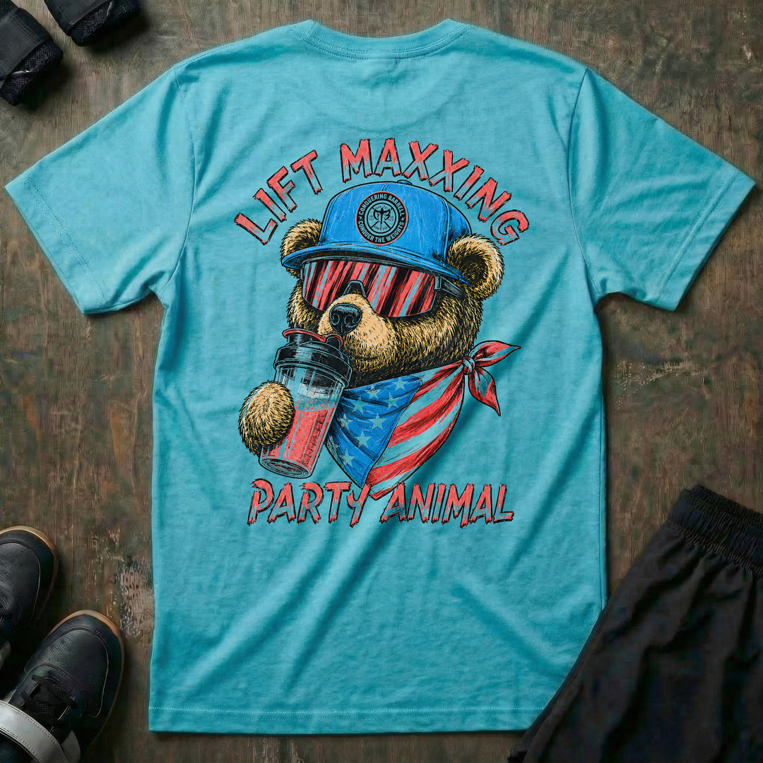 Lift Maxxing Teddy Bear tee in Tahiti: a swaggering teddy bear in red-striped shades