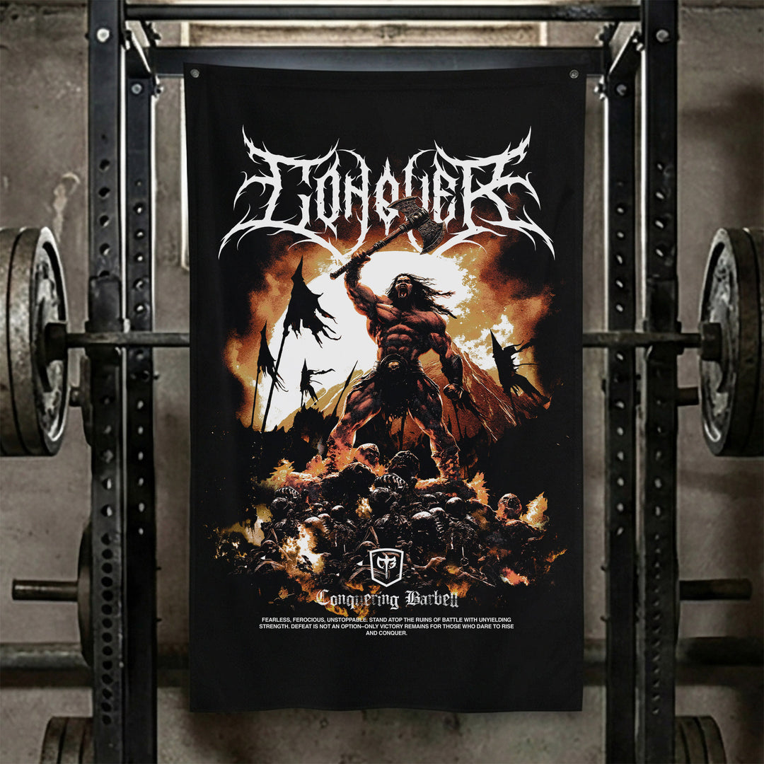The Barbarian - Polyester Flag, vertical black gym flag with barbarian raising his sword over a burning battlefield - Conquering Barbell