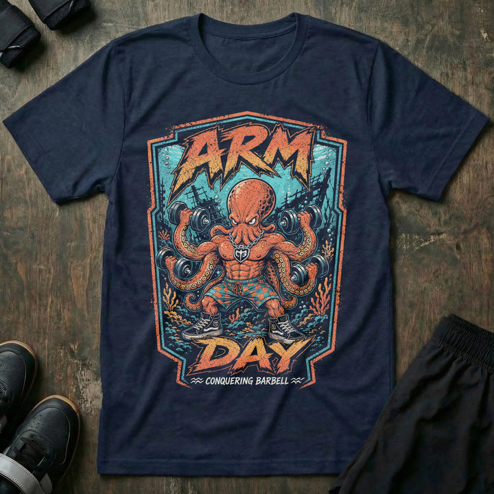 Arm Day Octopus tee in Navy: a jacked octopus in board shorts and skate shoes curling multiple dumbbells at once