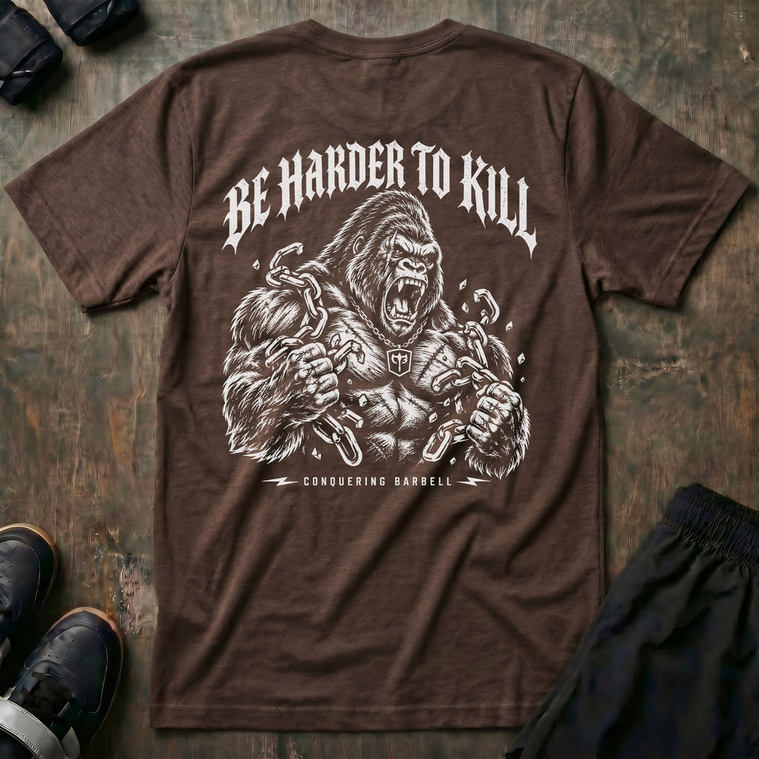 Be Harder to Kill Gorilla tee in Expresso: a massive silverback gorilla tearing heavy chains apart with both fists