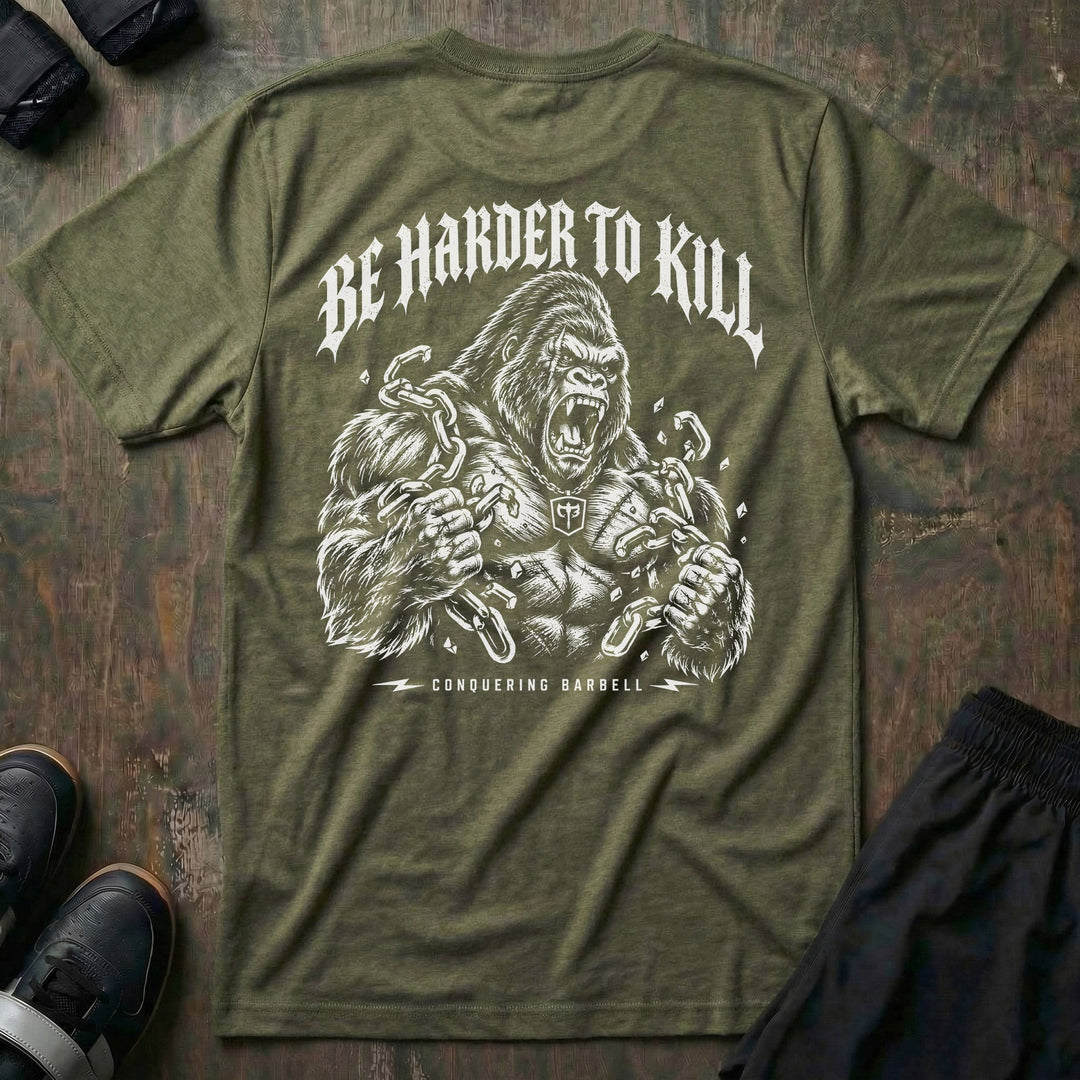 Be Harder to Kill Gorilla tee in Military: a massive silverback gorilla tearing heavy chains apart with both fists