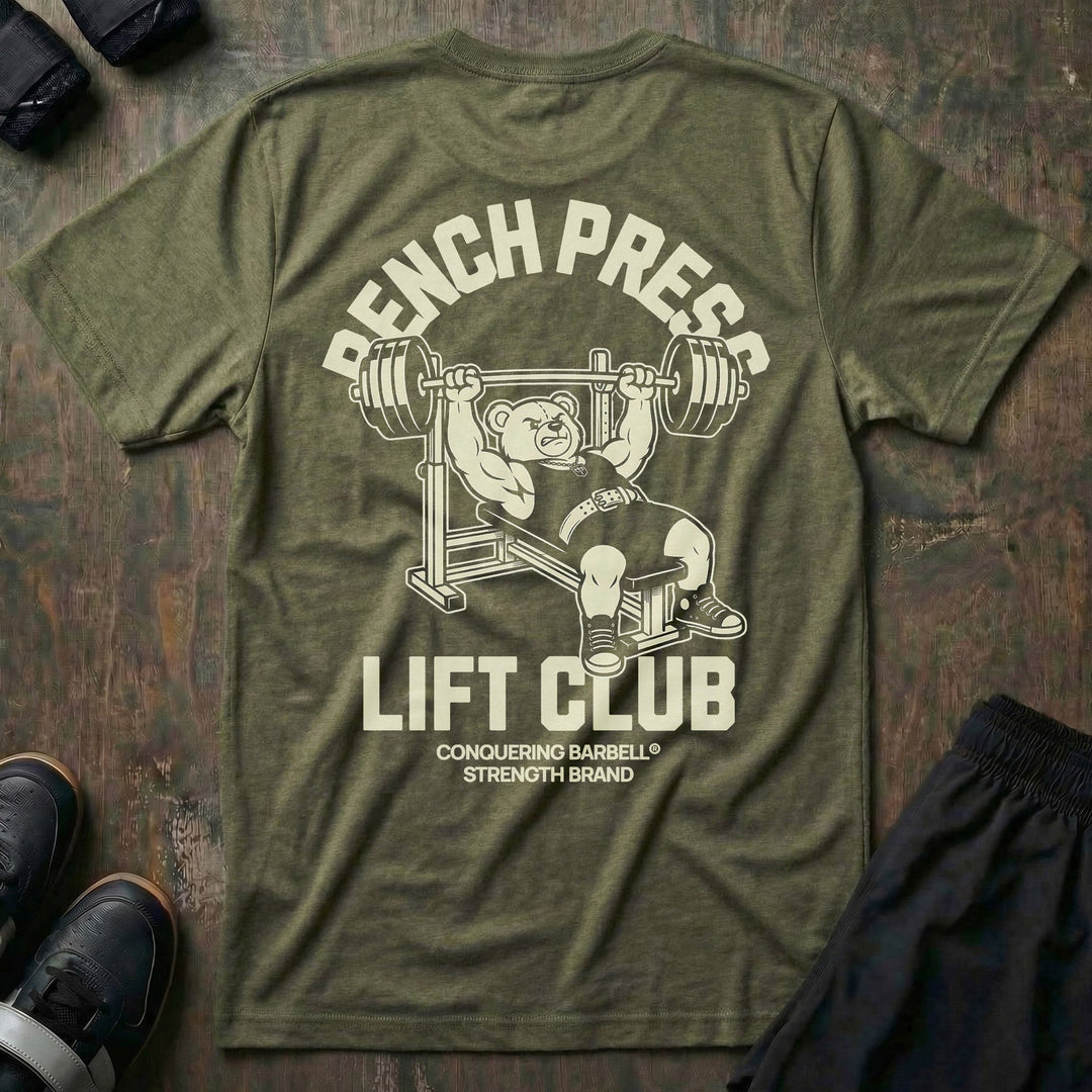 Bench Press Lift Club tee in Military: a classic teddy bear pressing heavy on the bench