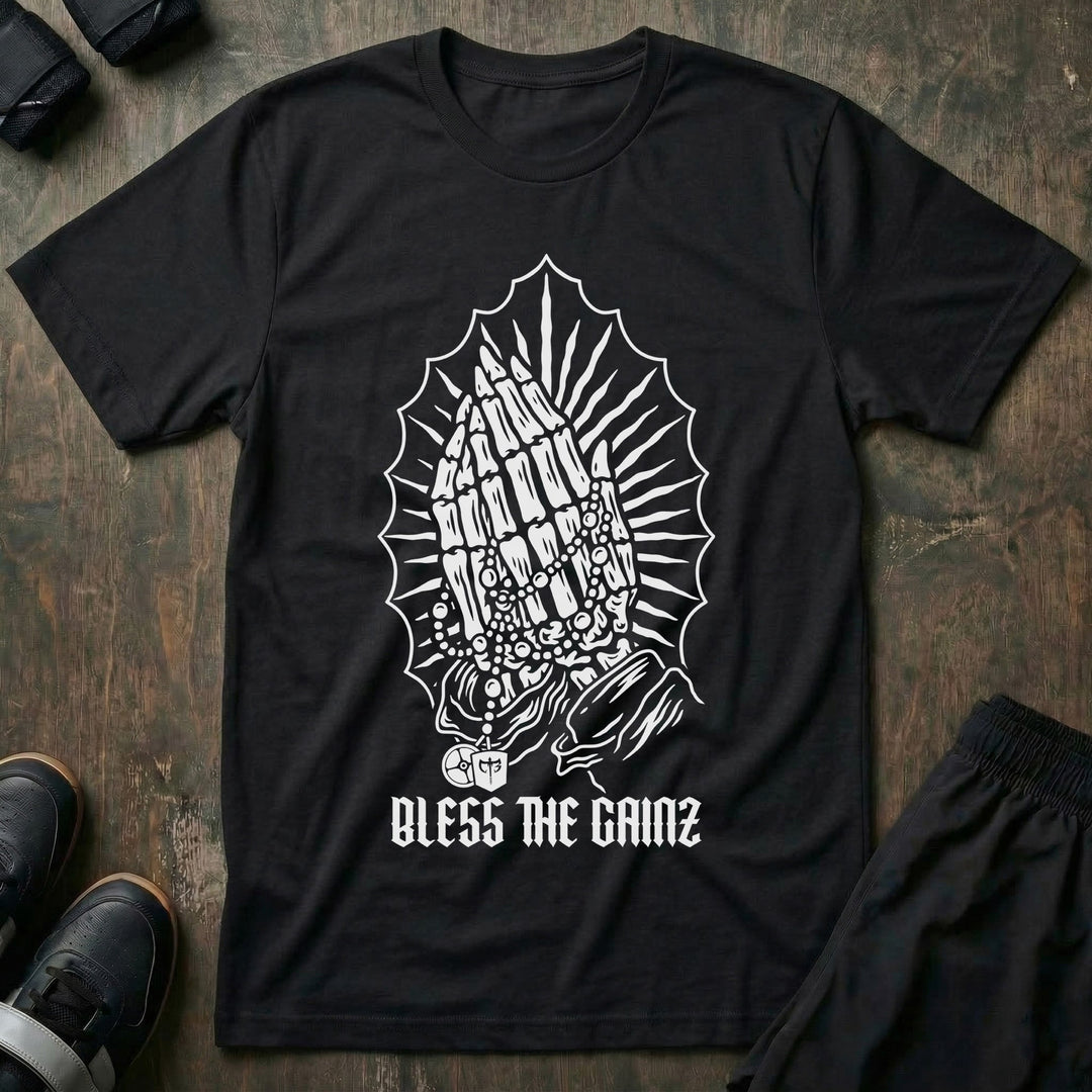 Bless the Gainz tee in Black: praying hands wrapped in a rosary inside a halo of radiating rays