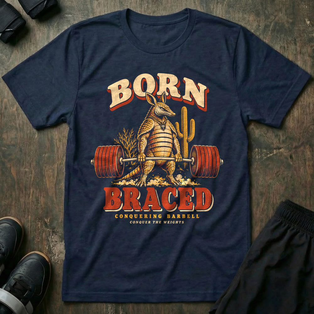 Born Braced - Tee front graphic in Navy with an armadillo deadlifting a loaded barbell in the desert - Conquering Barbell