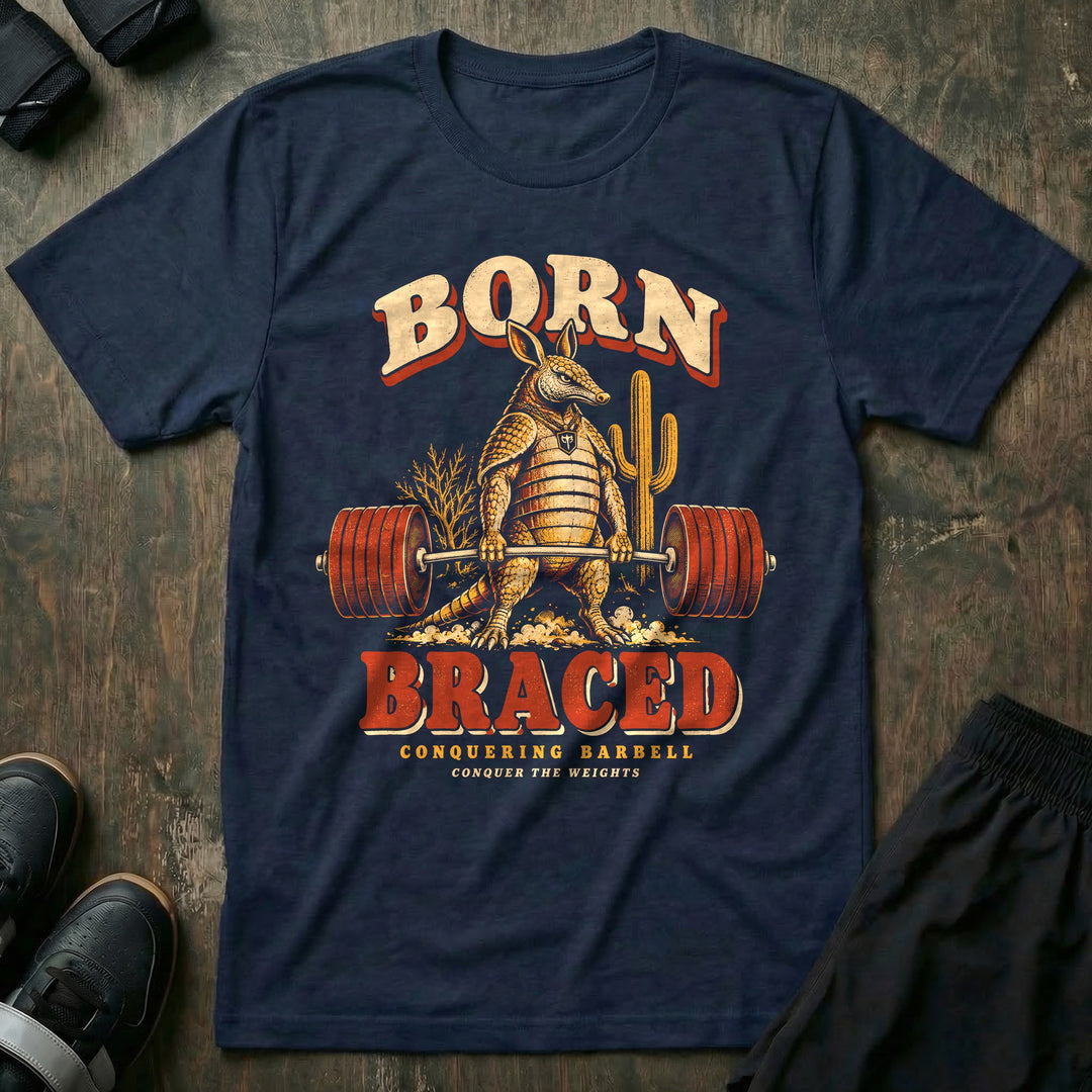 Born Braced - Tee front graphic in Navy with an armadillo deadlifting a loaded barbell in the desert - Conquering Barbell
