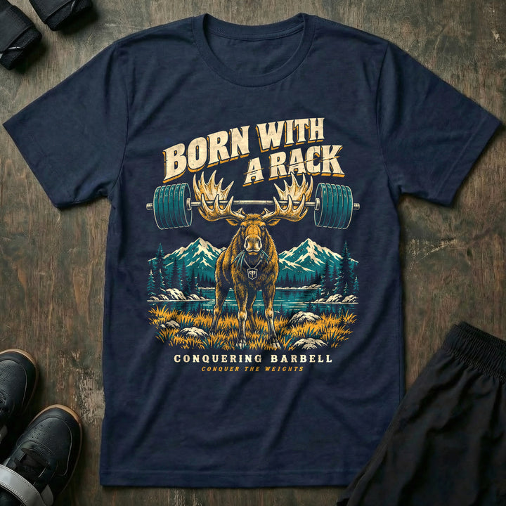 Born With a Rack - Tee front graphic in Navy with a bull moose with a loaded barbell racked across its antlers - Conquering Barbell