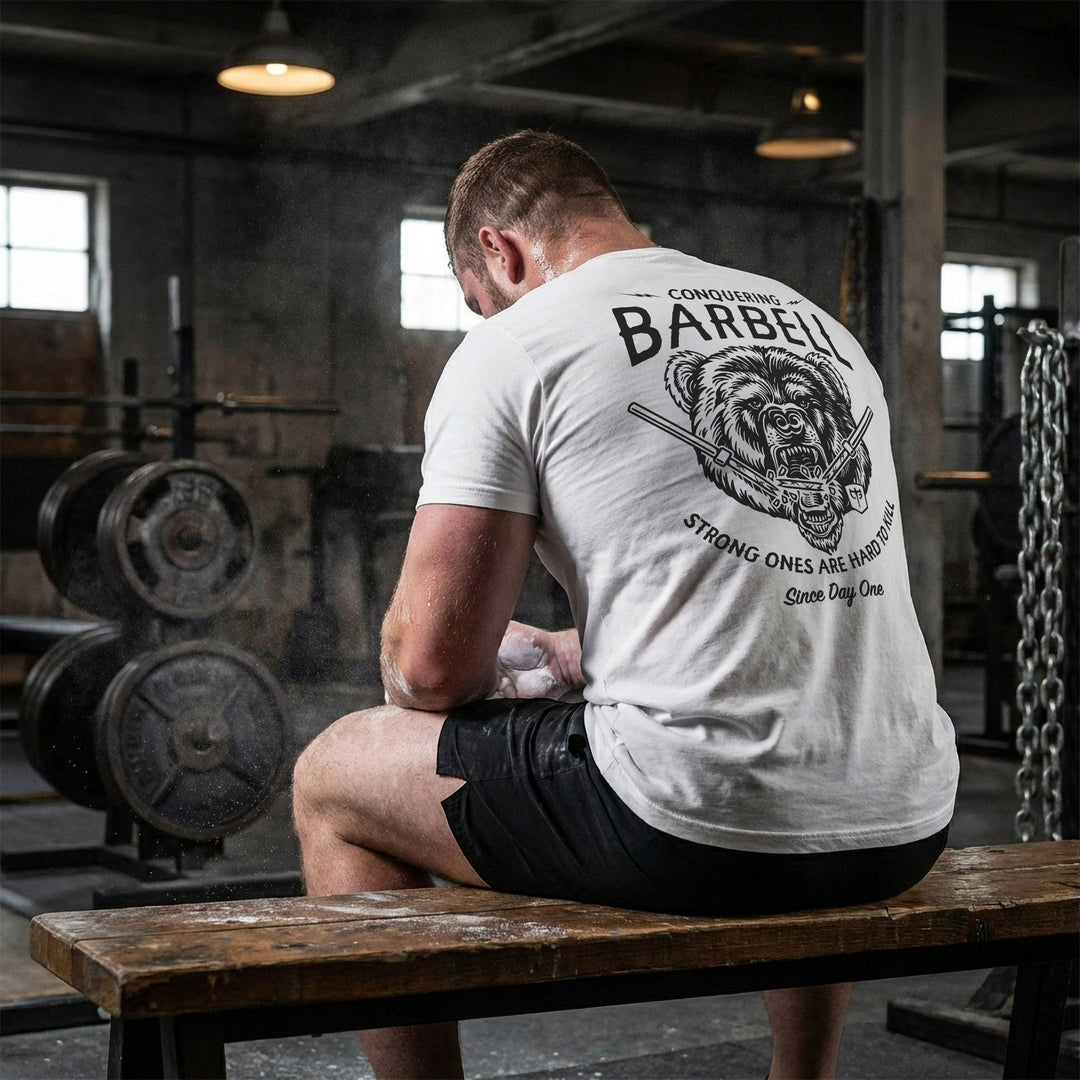 Breaking Barbell Bear - on White Tee - Conquering Barbell