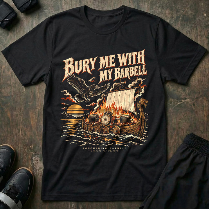 Bury Me With My Barbell - Tee front graphic in Black with a burning longship carrying a loaded barbell out to sea at sunset - Conquering Barbell