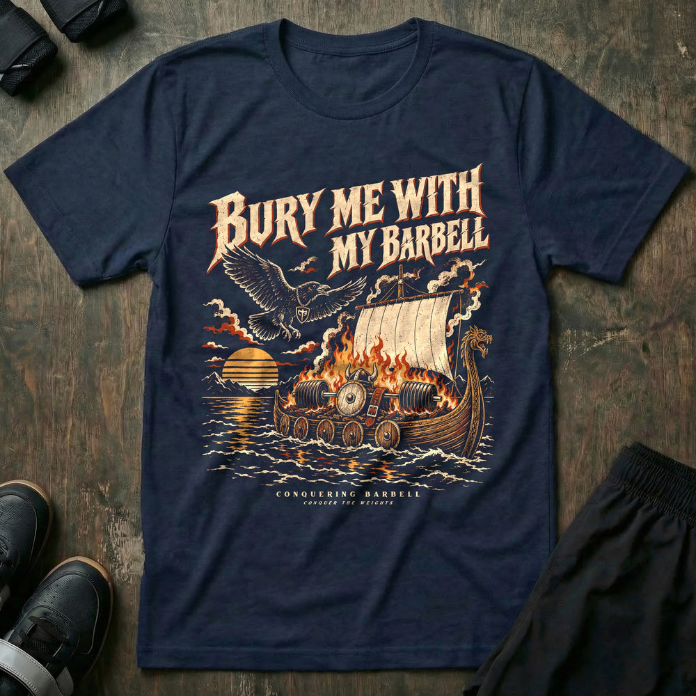 Bury Me With My Barbell - Tee front graphic in Navy with a burning longship carrying a loaded barbell out to sea at sunset - Conquering Barbell