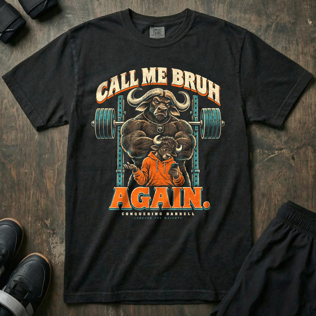 Call Me Bruh Again - Relaxed Fit Tee front graphic in Black with a cape buffalo dad with crossed arms standing behind a teenage buffalo in an orange hoodie looking at a phone - Conquering Barbell