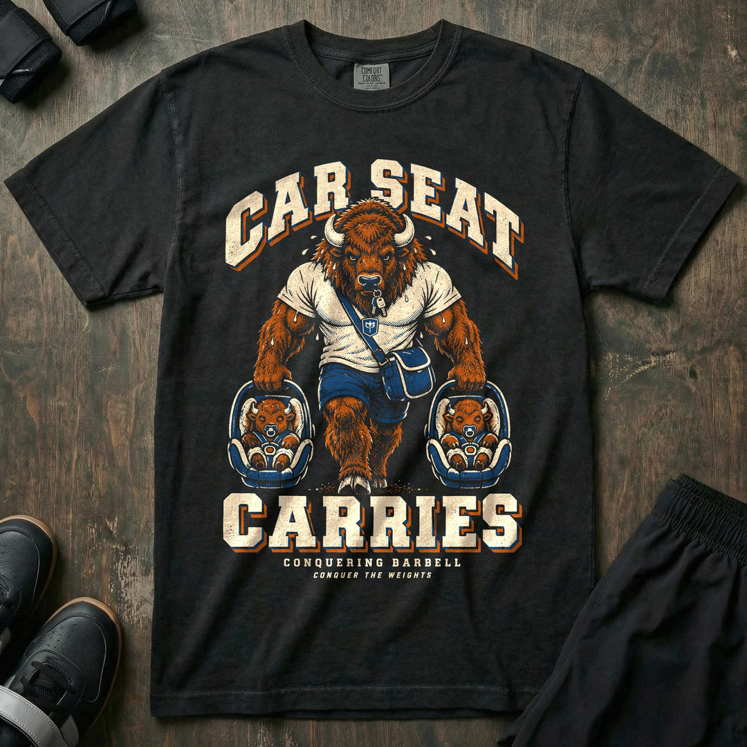Car Seat Carries - Relaxed Fit Tee front graphic in Black with a bison dad with a diaper bag carrying an infant car seat in each hand - Conquering Barbell