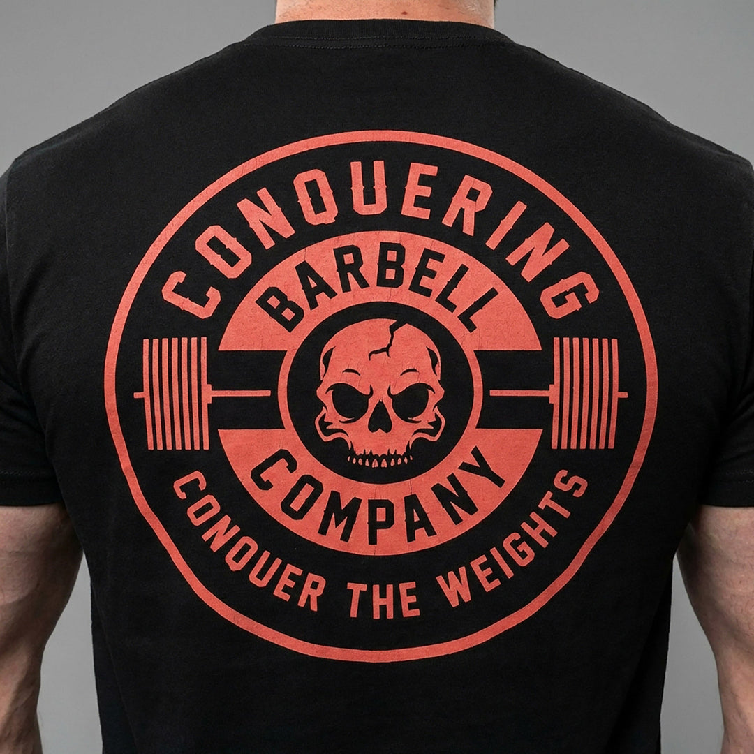 CB Iconic Badge - on Black Tee - Conquering Barbell