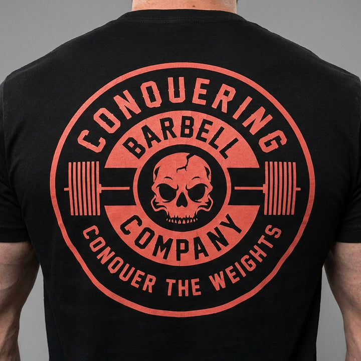 CB Iconic Badge - on Black Tee - Conquering Barbell