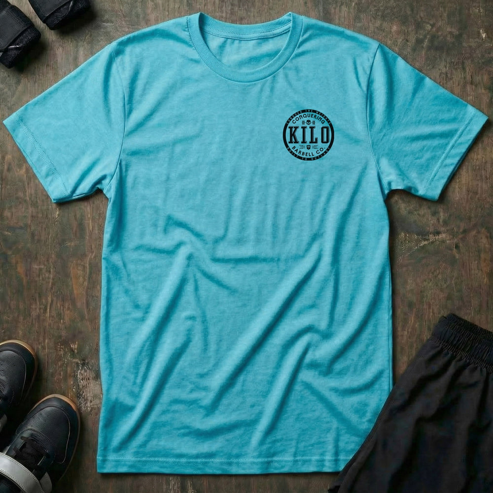 CB Kilo tee: a bold circular badge with block-letter KILO at the center