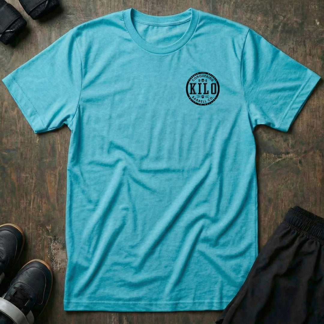 CB Kilo tee: a bold circular badge with block-letter KILO at the center