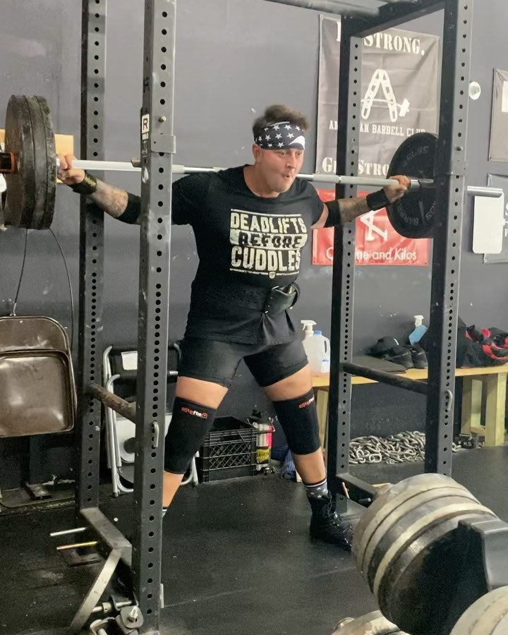 @_tactically_acquired squatting in the Deadlifts Before Cuddles tee
