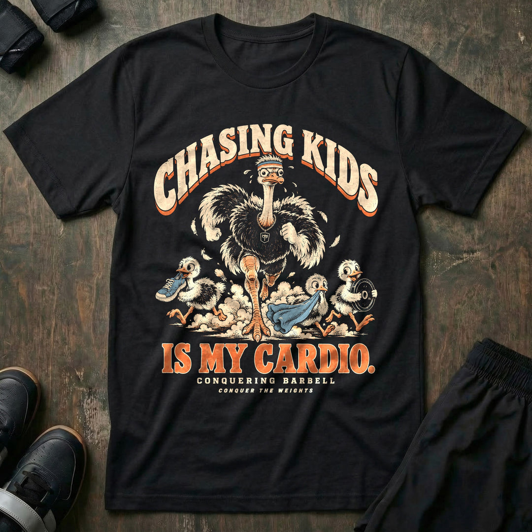 Chasing Kids Is My Cardio - Tee front graphic in Black with an ostrich dad in a headband running after three chicks carrying a sneaker, a towel and a weight plate - Conquering Barbell