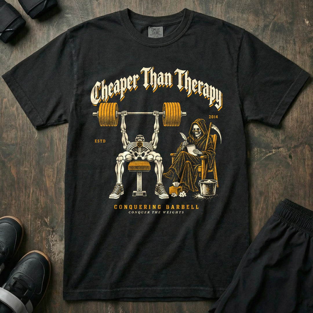 Cheaper Than Therapy - Relaxed Fit Tee front graphic in Black with a skeleton on the bench while the reaper takes notes in an armchair - Conquering Barbell