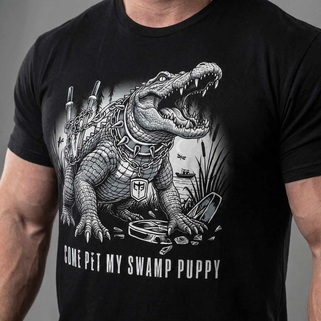 Come Pet My Swamp Puppy tee in Black: a jacked alligator in a spiked collar on a heavy chain