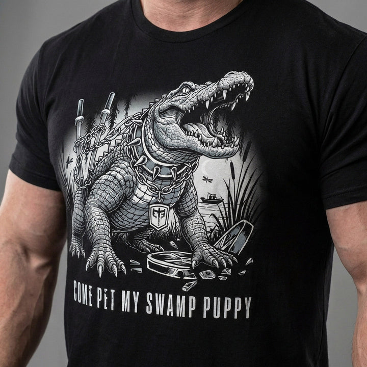 Come Pet My Swamp Puppy tee in Black: a jacked alligator in a spiked collar on a heavy chain