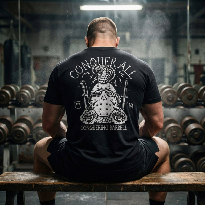 Conquer All Mask tee in Black: a distressed hockey mask wrapped in a coiling cobra
