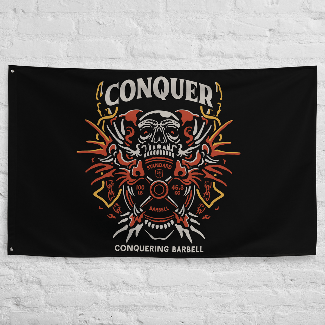 Conquer Dragon - Polyester Flag, horizontal gym flag hanging in a home gym - Conquering Barbell
