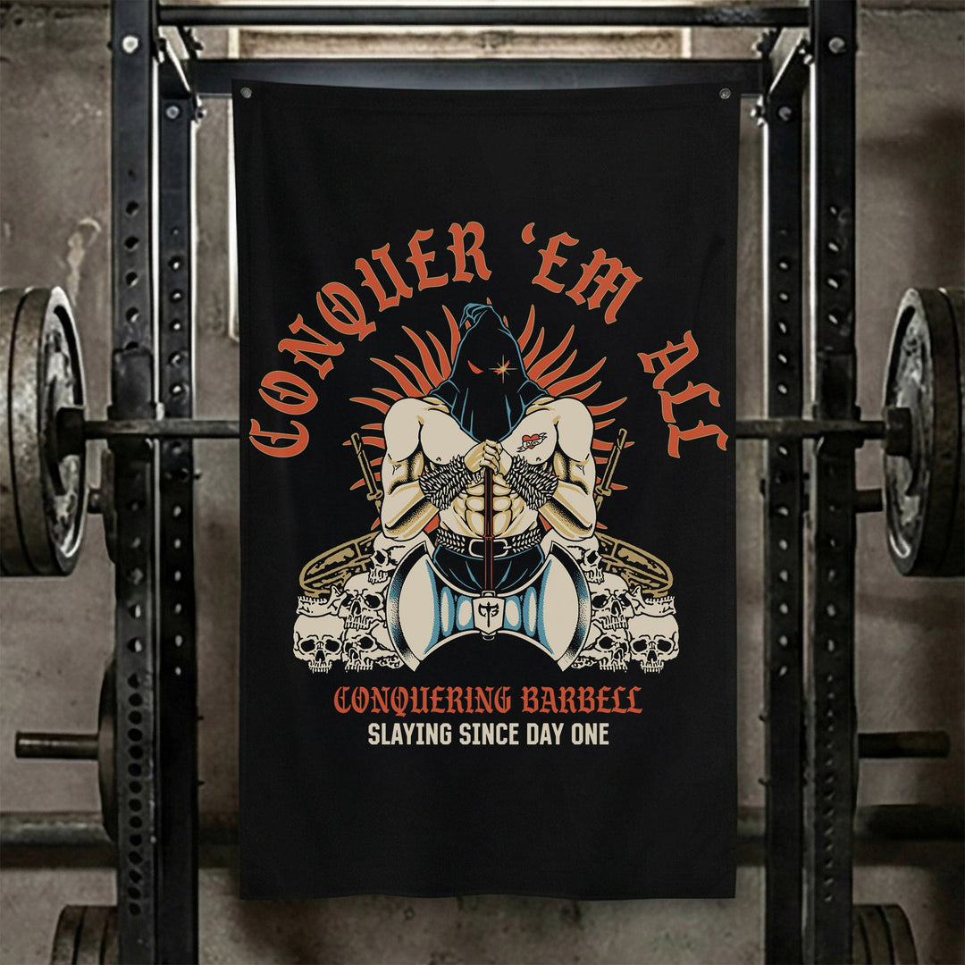Conquer 'Em All Flag - Polyester Flag, vertical black gym flag with hooded warrior enthroned on skulls and barbells - Conquering Barbell