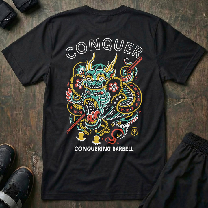 Conquer Gorilla tee in Black: an ornate tattoo-style gorilla wrapped in clouds and dragon scales in teal