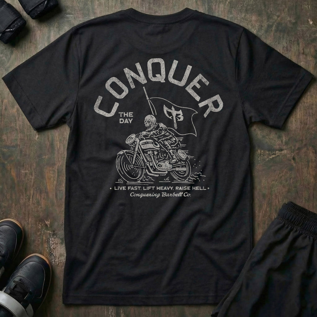 Conquer Motorcycle Club tee in Black: a skeleton rider flying the CB flag on his chopper
