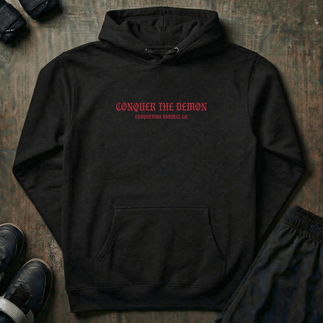 Conquer the Demon pullover hoodie in Black: a battle-worn samurai holding a defeated oni mask