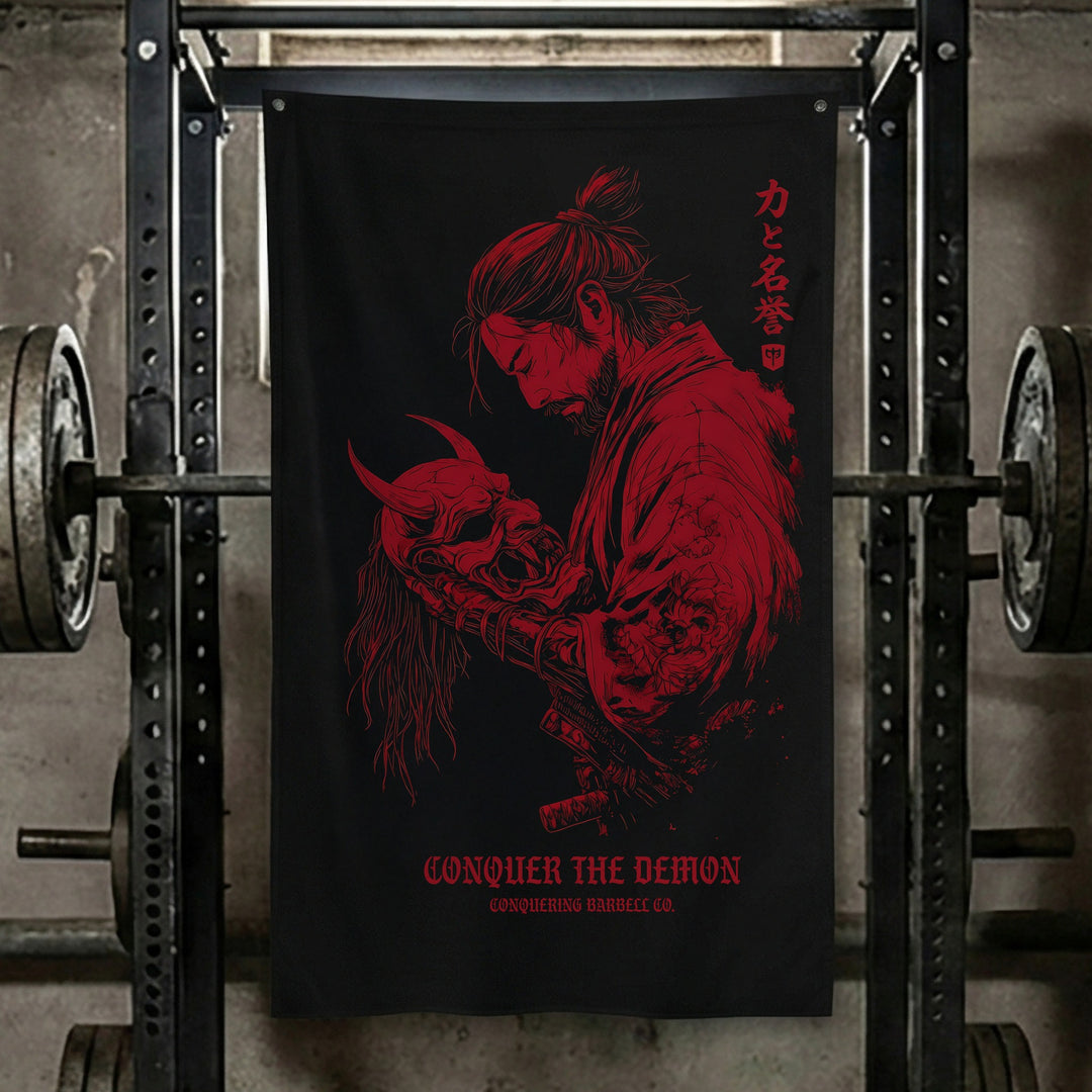 Conquer the Demon - Polyester Flag, vertical black gym flag with red samurai holding an oni head - Conquering Barbell