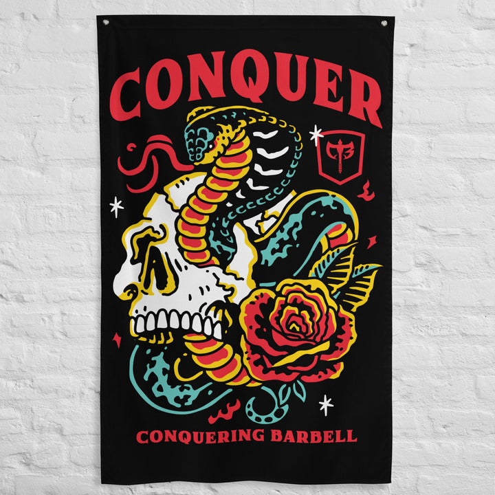 Conquer Till Death - Polyester Flag, vertical gym flag hanging in a home gym - Conquering Barbell