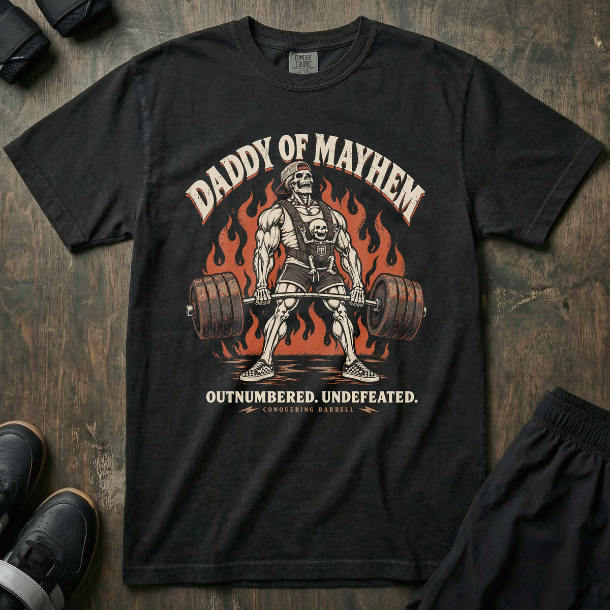 Daddy of Mayhem relaxed fit tee in Black: a skeletal dad pulling a loaded deadlift
