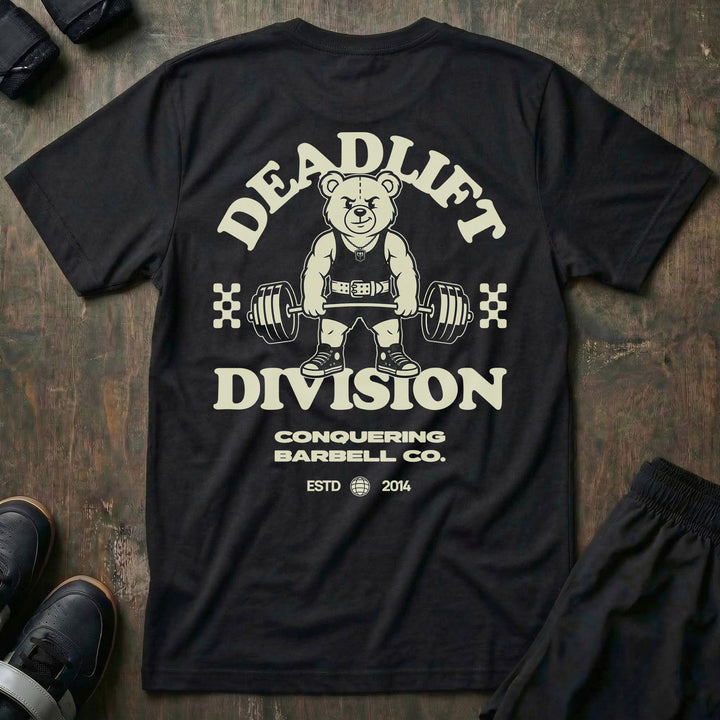 Deadlift Division tee in Black: a classic teddy bear pulling heavy in a lifting belt