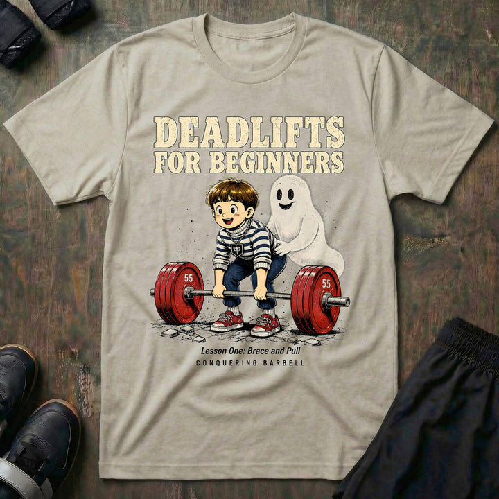 Deadlifts for Beginners tee in Sand: a retro anime kid setting up on a loaded barbell