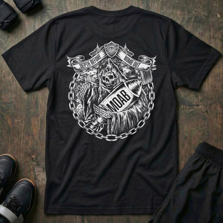 Depth Before Bomb Out tee in Black: a grim reaper cradling a MOAB bomb inside a ring of heavy chain