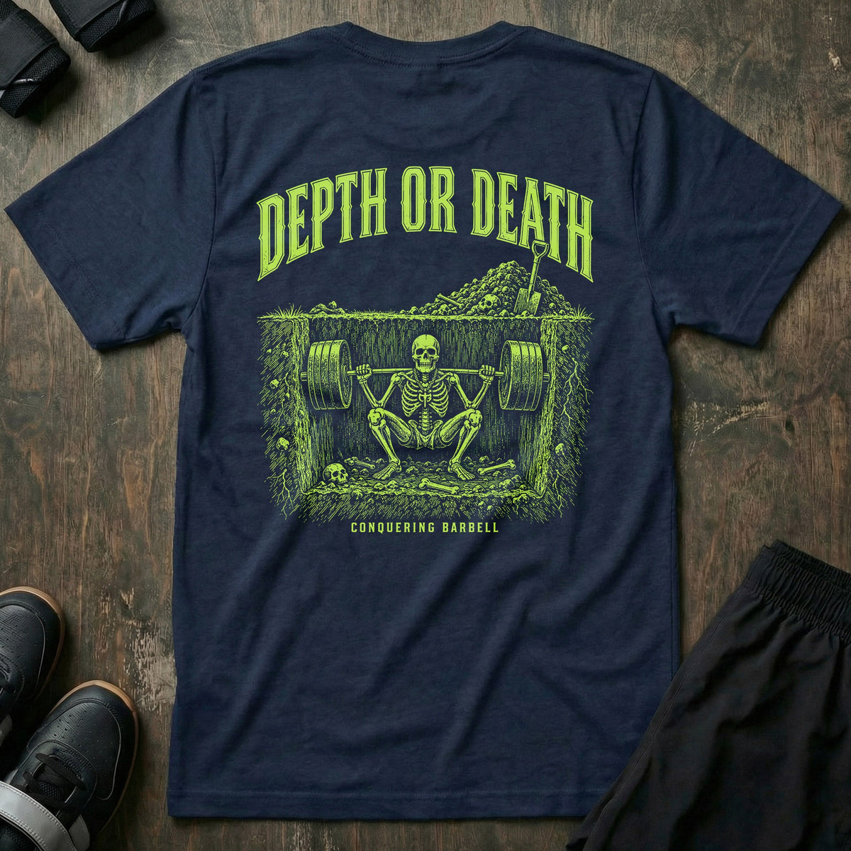 Depth or Death tee in Navy: a skeleton buried beneath the surface