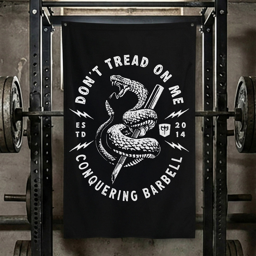 Don't Tread on Me (Version 2) - Black - Polyester Flag, vertical black gym flag with coiled rattlesnake around a barbell in a round badge - Conquering Barbell