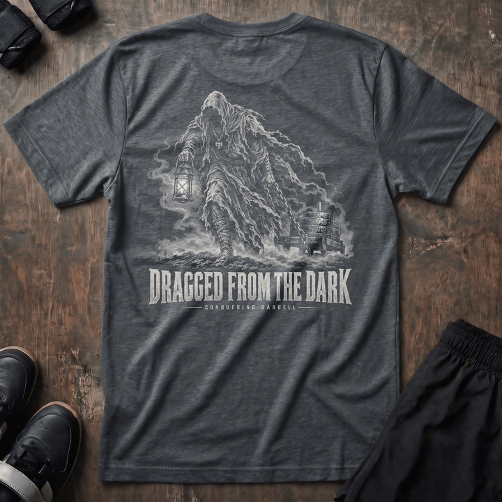 Dragged from the Dark tee in Heather Heavy Metal: a faceless hooded figure carrying a smoking lantern