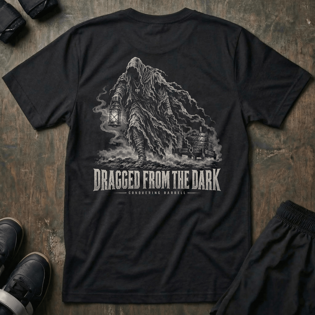 Dragged from the Dark tee in Black: a faceless hooded figure carrying a smoking lantern