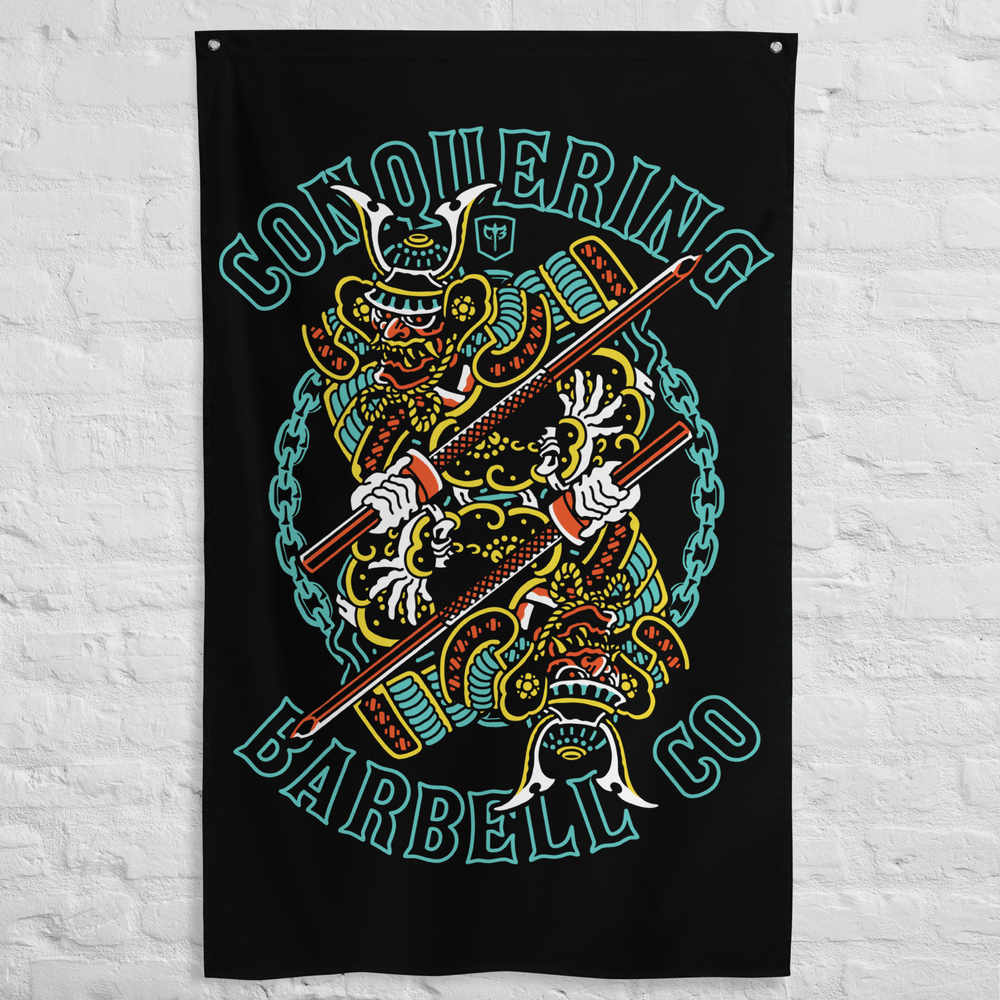 Dual Samurai - Polyester Flag, vertical gym flag hanging in a home gym - Conquering Barbell