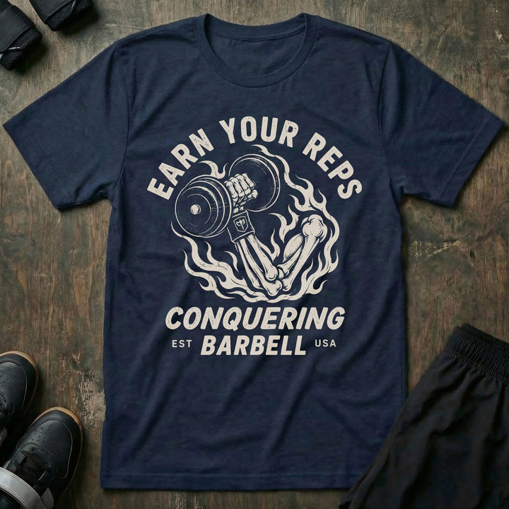 Earn Your Reps tee in Navy: a skeletal hand rising from a ring of fire gripping a loaded dumbbell