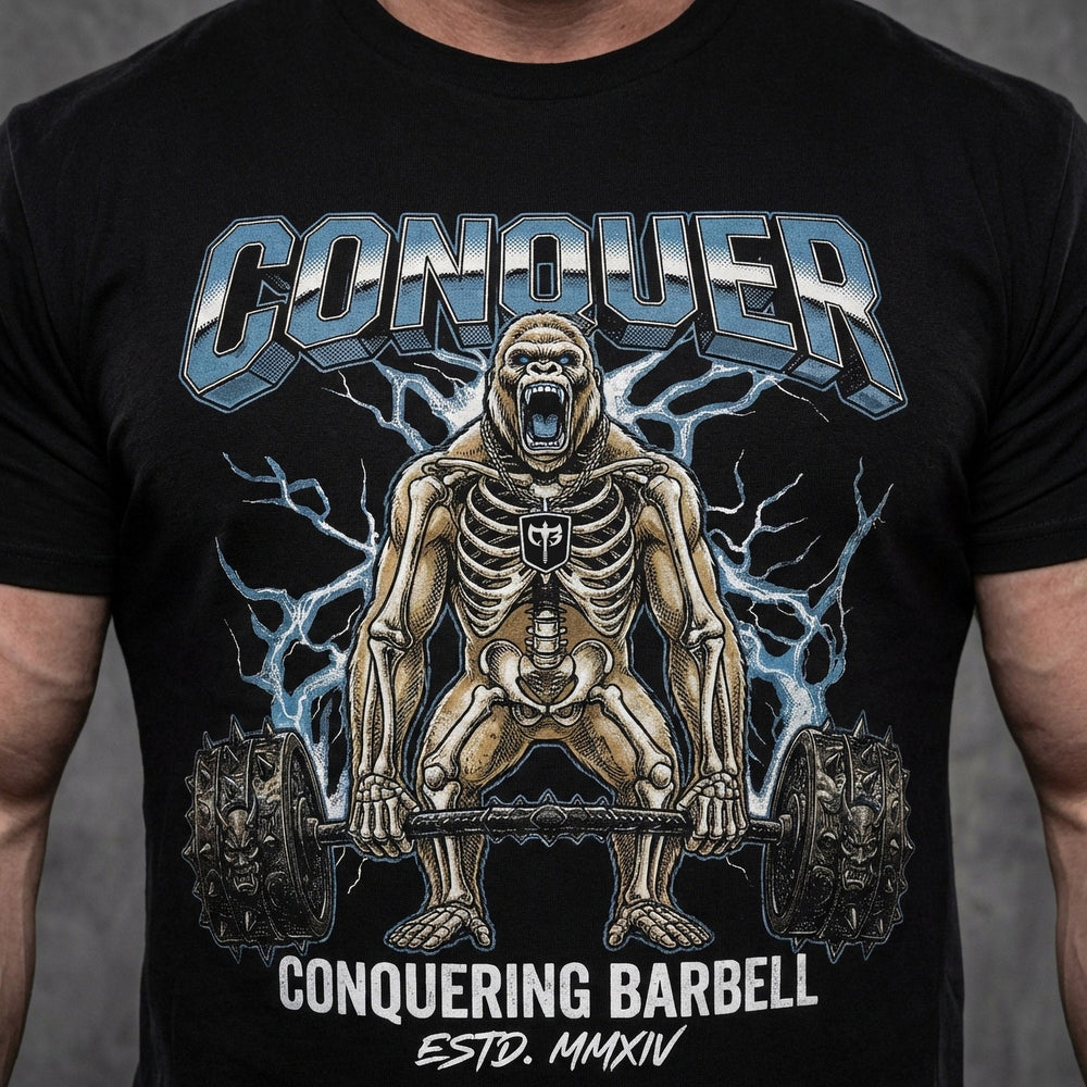 Electric Gorilla tee in Black: a skeleton gorilla locked in at the top of a deadlift with a spiked barbell loaded heavy