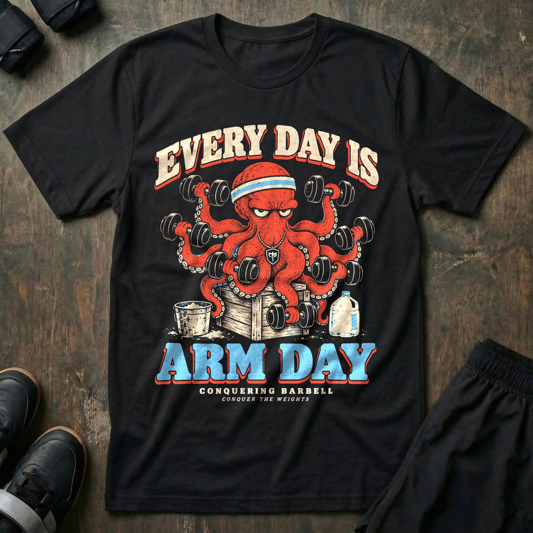Every Day Is Arm Day - Tee front graphic in Black with a red octopus curling a dumbbell in every arm - Conquering Barbell