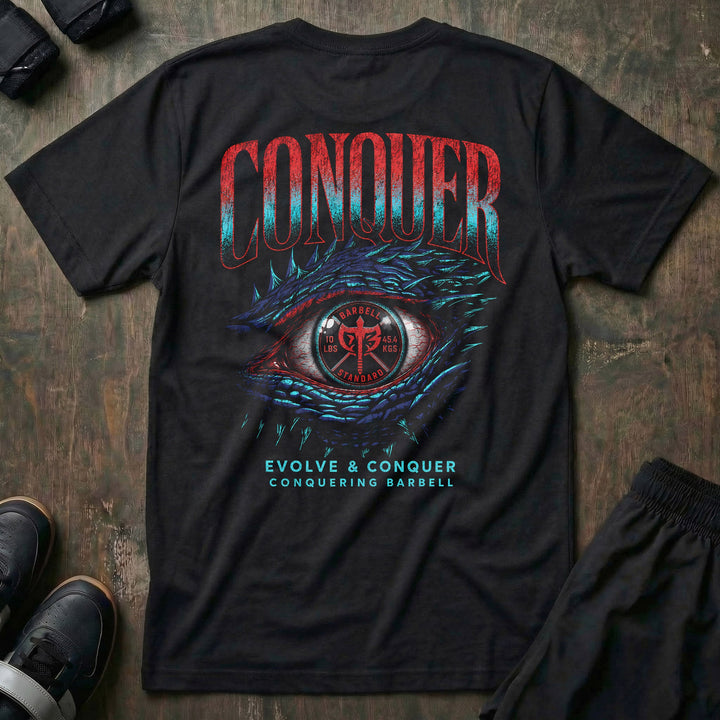 Evolve &amp; Conquer tee in Black: a massive dragon eye with deep blue and purple scales peeling back to reveal a cracked