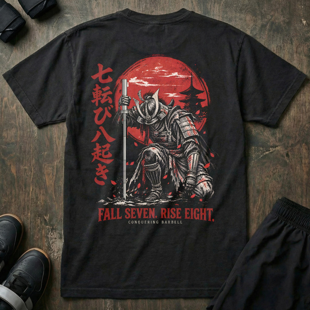 Fall Seven Rise Eight relaxed fit tee in Black, back print: samurai rising with a barbell-katana before a red sun